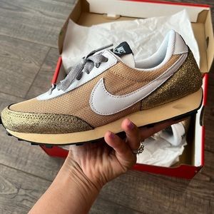Womens gold Nike